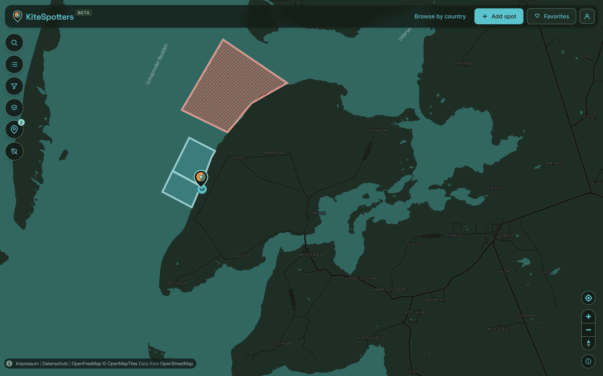 Two riding areas along the shore of Suhrendorf on Rügen, with a hatched no-go area to the north.